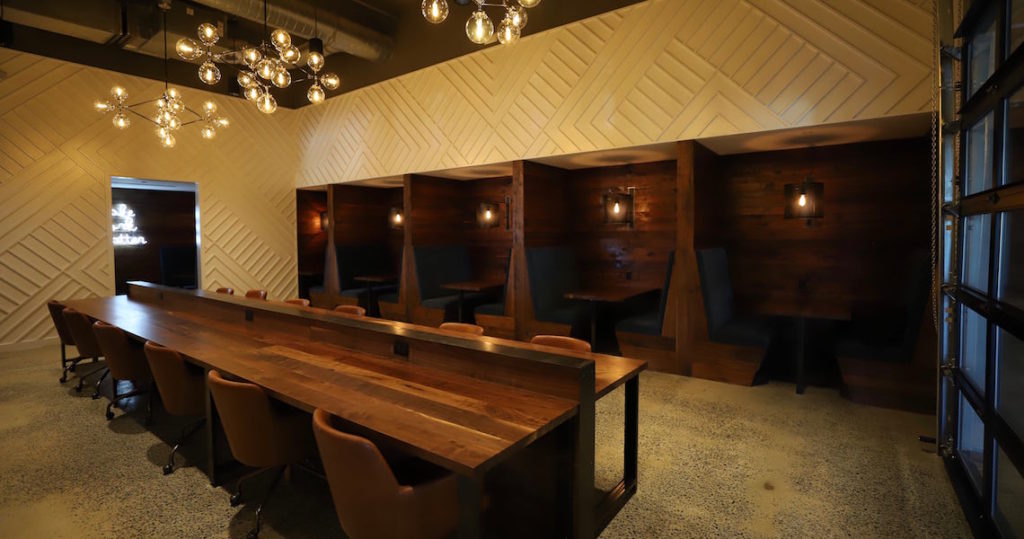 Coworking table and coworking booths at Roam Perimeter Center