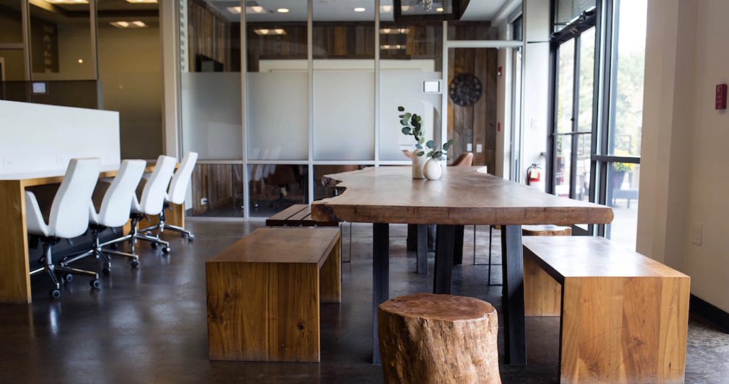 Community table and coworking space at Roam Alpharetta