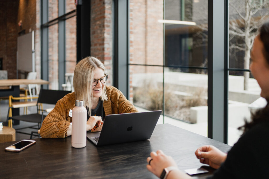 two people networking at a coworking space