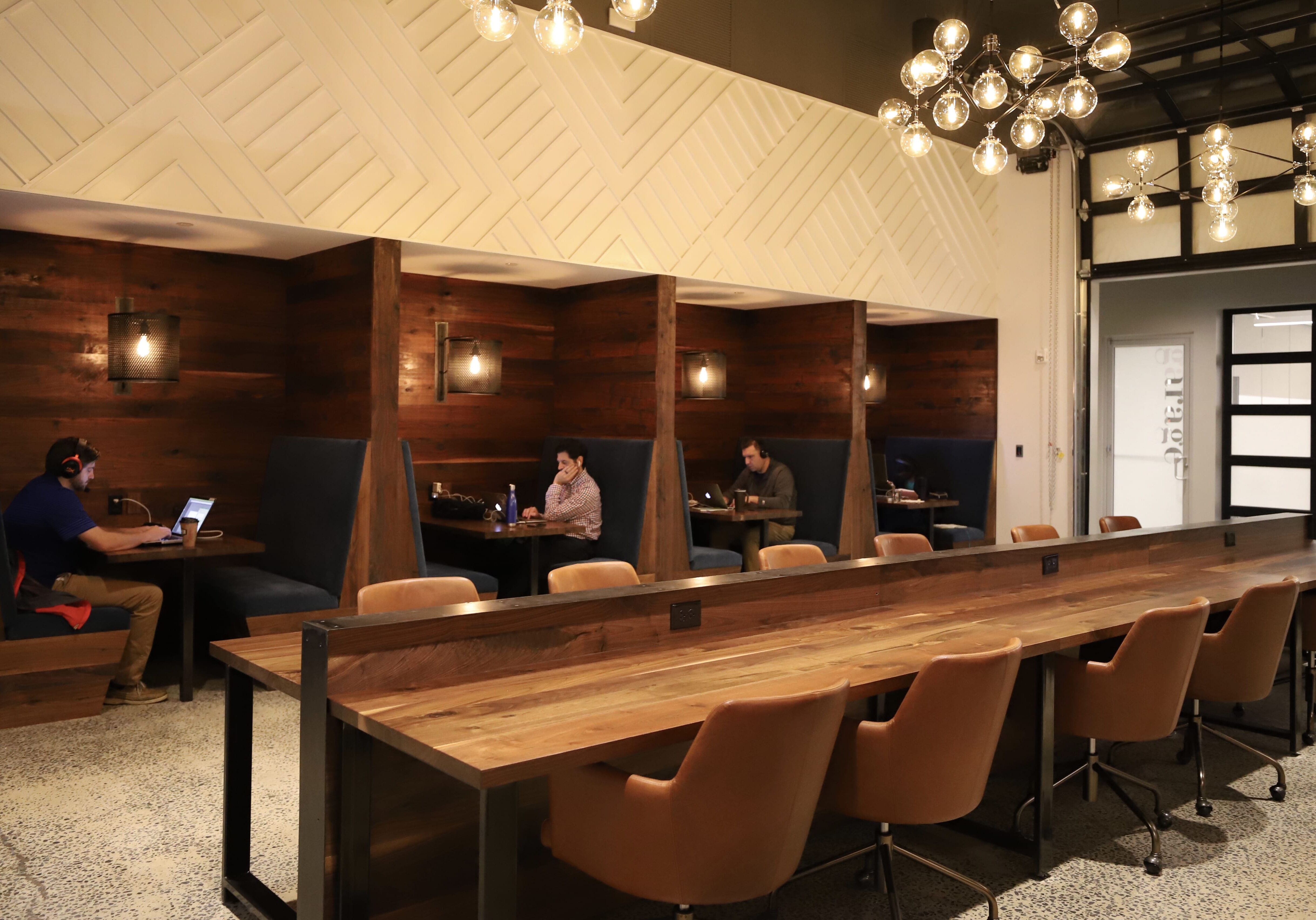 group of people working in a coworking space